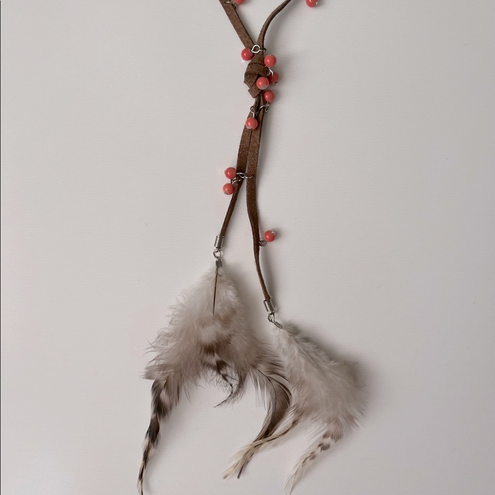 Long leather and feather necklace
